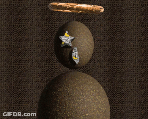 A Statue Of An Egg With A Cross On It 'S Eye GIF