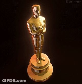A Statue Of An Oscar Winner On A Pedestal With Gifmania Written On The Bottom GIF