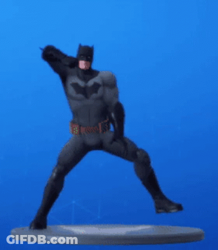 A Statue Of Batman Standing On One Leg On A Blue Background GIF