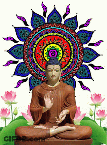 A Statue Of Buddha Sits In Front Of A Colorful Mandala And Lotus Flowers GIF