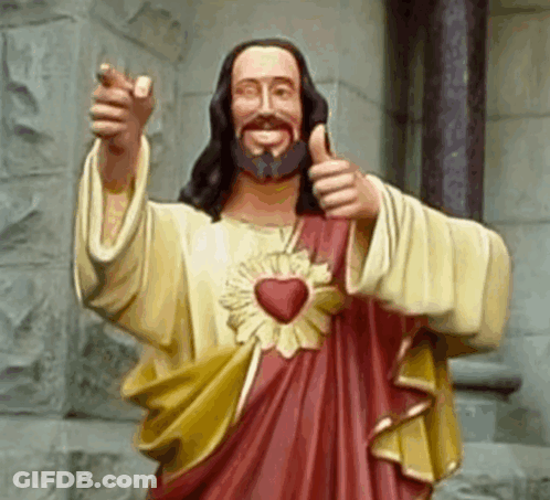 A Statue Of Jesus Is Giving The Thumbs Up Sign GIF
