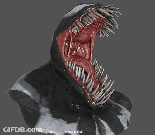 A Statue Of Venom With A Marvel Logo In The Corner GIF
