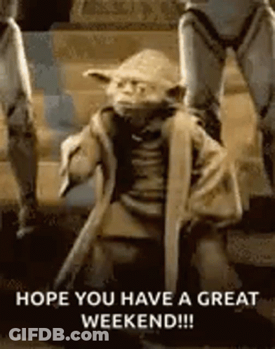 A Statue Of Yoda From Star Wars Is Kneeling Down On The Ground . GIF