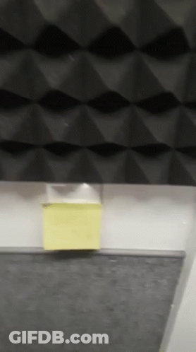 A Sticky Note On A Wall That Says ' I 'M Sorry ' GIF