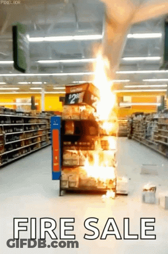 A Store Aisle With A Fire Sale Sign GIF