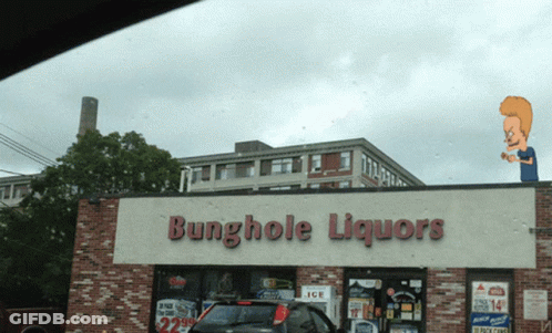 A Store Called Bunghole Liquors Has A Cartoon Character On Top GIF