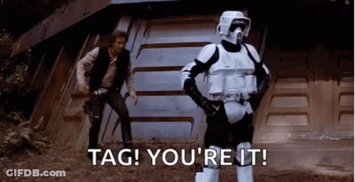 A Stormtrooper Is Standing Next To A Man In A Star Wars Movie And Says Tag ! You 'Re It ! GIF