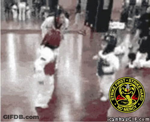 A Strike First Strike Hard No Mercy Logo Is On A Red Background GIF