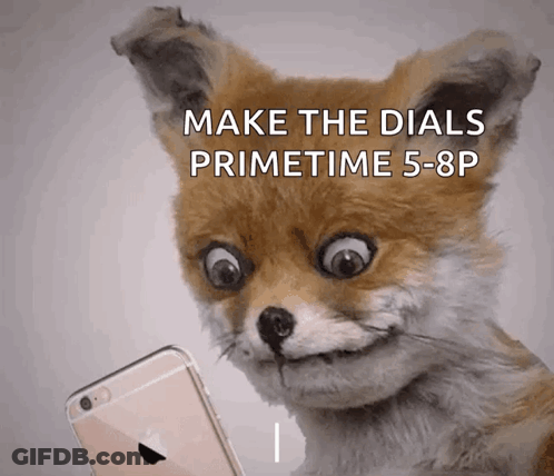 A Stuffed Animal Fox Is Looking At An Apple Iphone GIF
