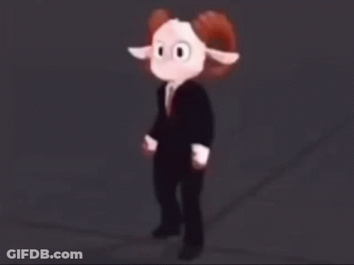 A Stuffed Animal In A Suit And Tie Is Running Across A Dark Street . GIF