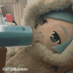 A Stuffed Animal Is Drinking From A Syringe GIF