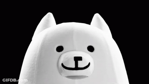 A Stuffed Animal Is Holding A Nintendo Switch With A Pixelated Dog On The Screen GIF