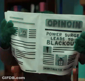 A Stuffed Animal Is Reading A Newspaper That Says Opinion On It GIF