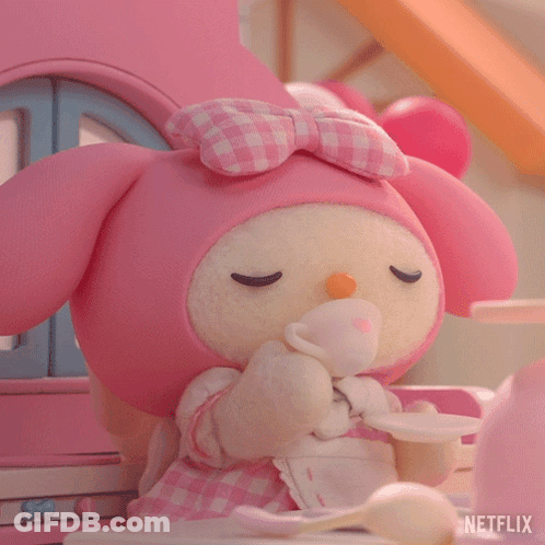 A Stuffed Animal Is Sitting At A Table With A Cup And Saucer And A Netflix Logo In The Corner GIF