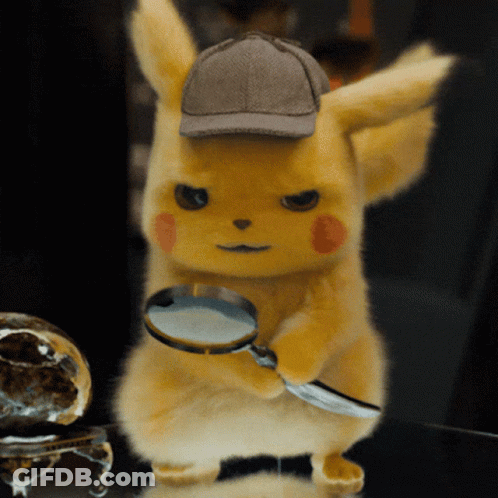 A Stuffed Animal Wearing A Detective Hat Holds A Magnifying Glass GIF