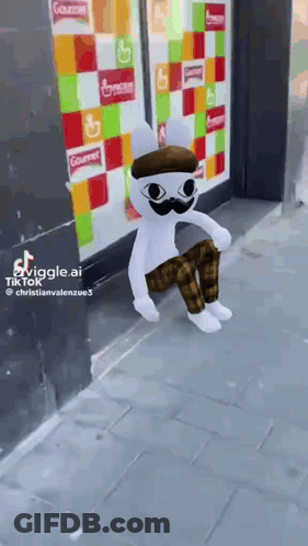 A Stuffed Animal Wearing A Hat And A Mustache Is Sitting On The Sidewalk . GIF