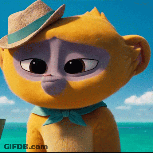 A Stuffed Animal Wearing A Hat And Scarf Looks At The Camera GIF