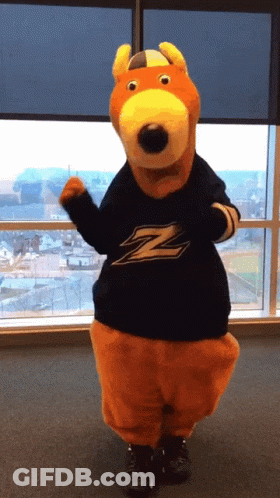 A Stuffed Animal Wearing A Shirt That Says Z On It GIF