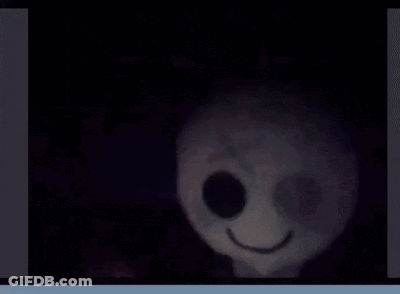 Smiling Stuffed Animal With Big Eyes GIF