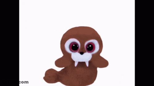 A Stuffed Animal With Big Eyes And A Long Tail Is A Walrus GIF