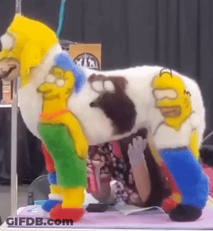 A Stuffed Animal With Homer Simpson And Bart Simpson On It GIF