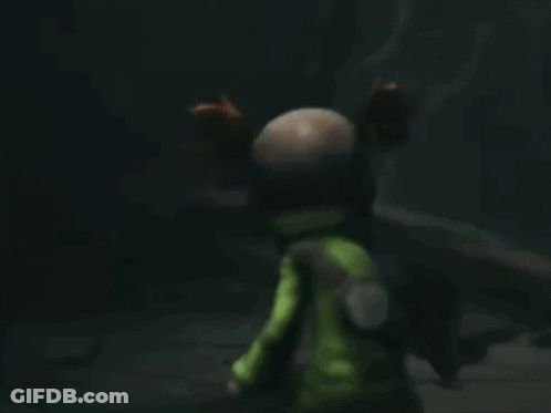 A Stuffed Animal With Pigtails And A Gas Mask GIF