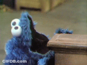 A Stuffed Animal With The Number 8 On Its Face GIF