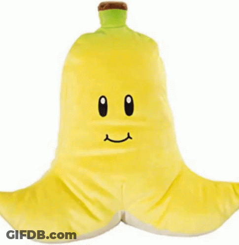 A Stuffed Banana With A Smiley Face On Its Face GIF