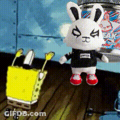 A Stuffed Bunny Wearing A Black Shirt With The Word Spongebob On It Is Standing Next To A Spongebob Doll GIF