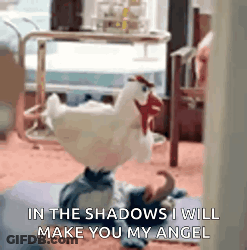 A Stuffed Chicken Is Sitting On A Yoga Mat With The Words In The Shadows I Will Make You My Angel GIF