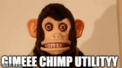 A Stuffed Chimp Says Gimeee Chimp Utilityy In Front Of A Wall . GIF