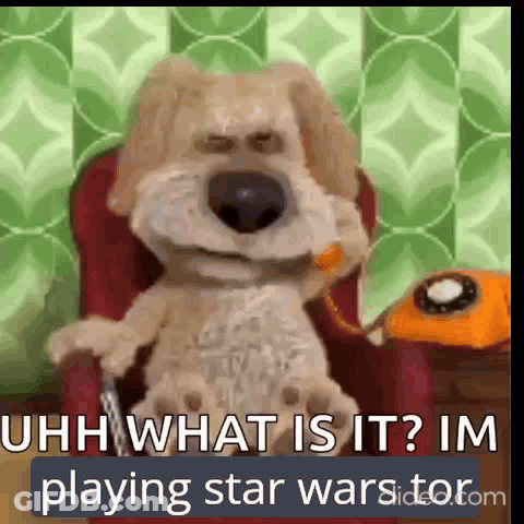 A Stuffed Dog Is Sitting In A Chair And Talking On A Phone . GIF
