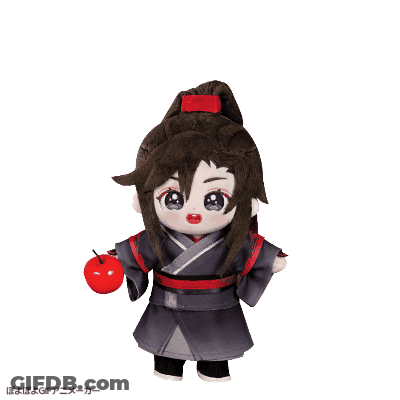 A Stuffed Doll Is Holding A Red Apple With Chinese Writing On It GIF