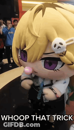 A Stuffed Doll With A Skull On Her Head And The Words Whoop That Trick GIF