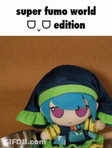 Blue-Haired Doll Sitting Next To Food Bowl GIF