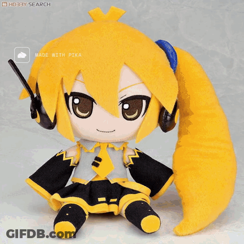 A Stuffed Doll With Headphones And A Yellow Tail Is Made By Pika GIF