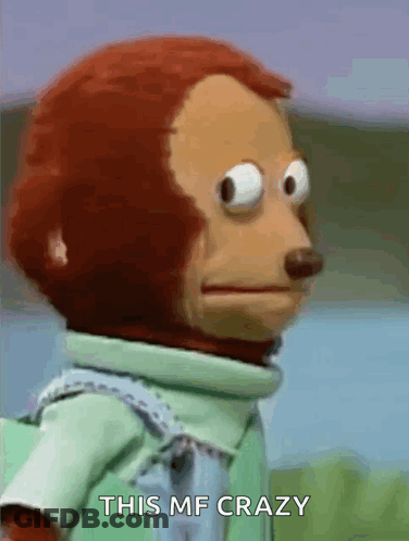 A Stuffed Monkey Is Making A Funny Face And Says This Mf Crazy . GIF