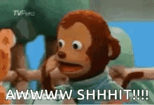 A Stuffed Monkey Is Talking On A Cell Phone And Says Awww Shhhit !!! GIF
