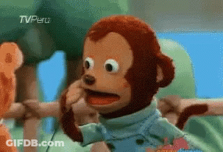 A Stuffed Monkey Talking On A Phone With Tv Peru Written On The Bottom Right GIF
