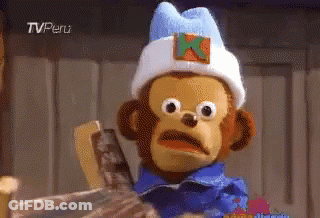 A Stuffed Monkey Wearing A Blue Shirt And A White Hat With An X On It GIF