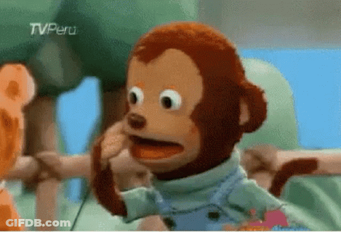 A Stuffed Monkey With A Tv Peru Logo On The Bottom Left GIF
