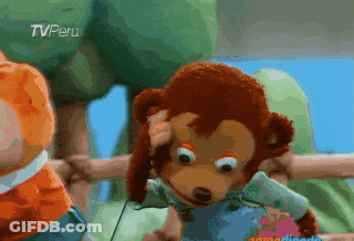 A Stuffed Monkey With A Tv Peru Logo On The Bottom Left GIF