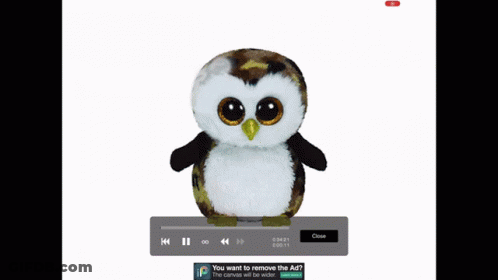 A Stuffed Owl That Is Made In Italy Is Sitting On A Blue Background GIF