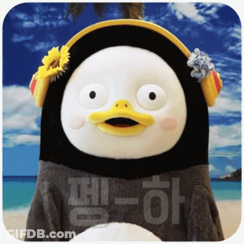 A Stuffed Penguin With Headphones And A Sunflower In Its Hair GIF