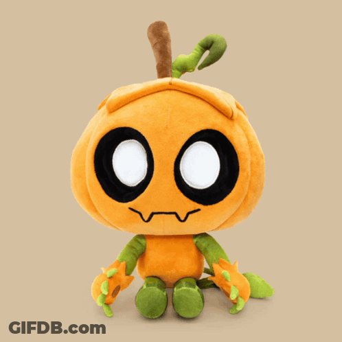 A Stuffed Pumpkin With Glowing Eyes And Green Arms GIF