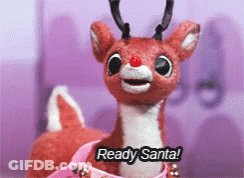 A Stuffed Reindeer With The Words Ready Santa On It GIF