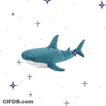 A Stuffed Shark Is Surrounded By Stars And Dots GIF