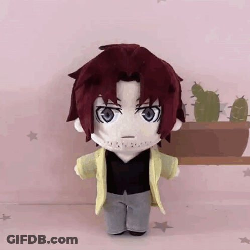 Red Hair Stuffed Toy Standing By Cactus GIF