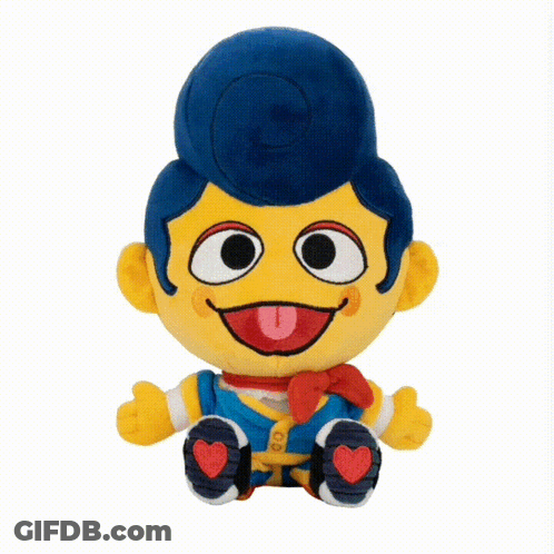 A Stuffed Toy With A Tongue Sticking Out And A Blue Haircut GIF