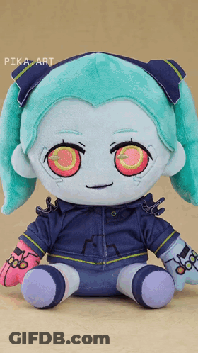 A Stuffed Toy With Pika Art Written On The Bottom Right GIF